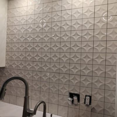 white tile backsplash installation